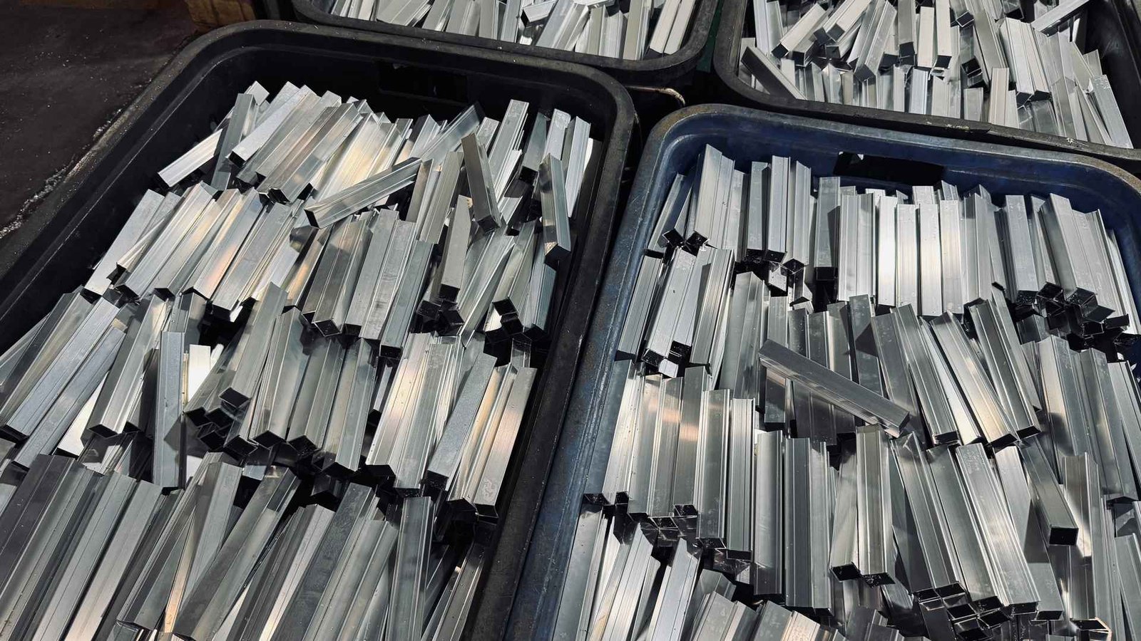 Massive storage bins filled with mortise lock faceplates