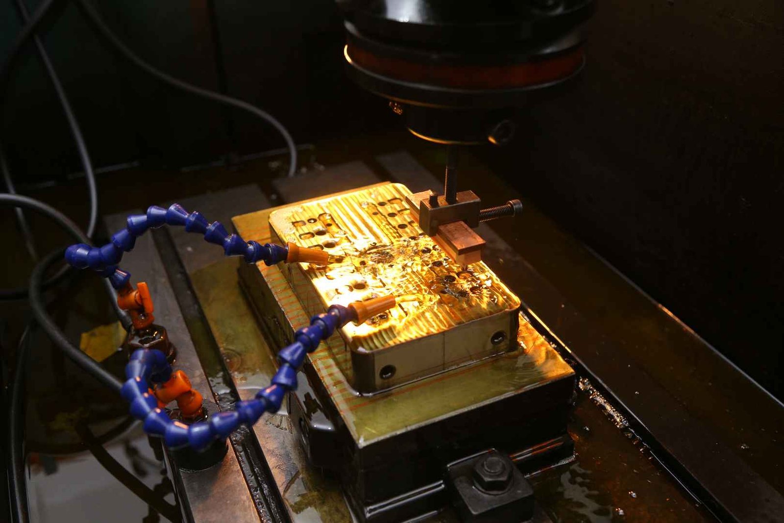 EDM electrical discharge machining on metal mold surface