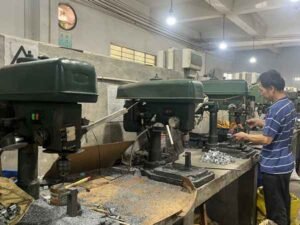 bench-drill-press-workstation-zinc-alloy-lock-hardware-drilling-process-lock-factory-production-workshop