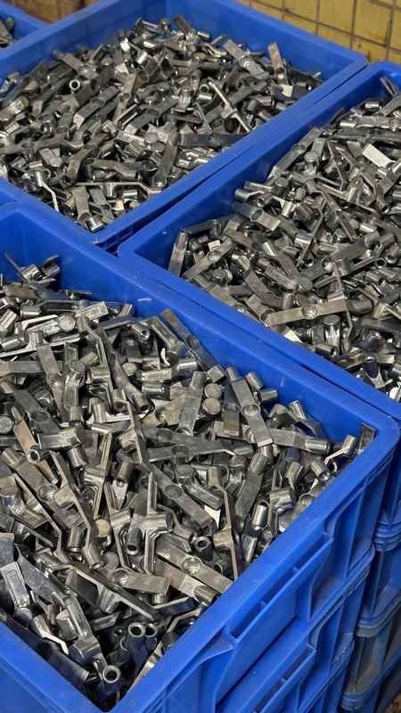 Wholesale door hardware lock internal accessories stored in factory blue storage bins for direct OEM export